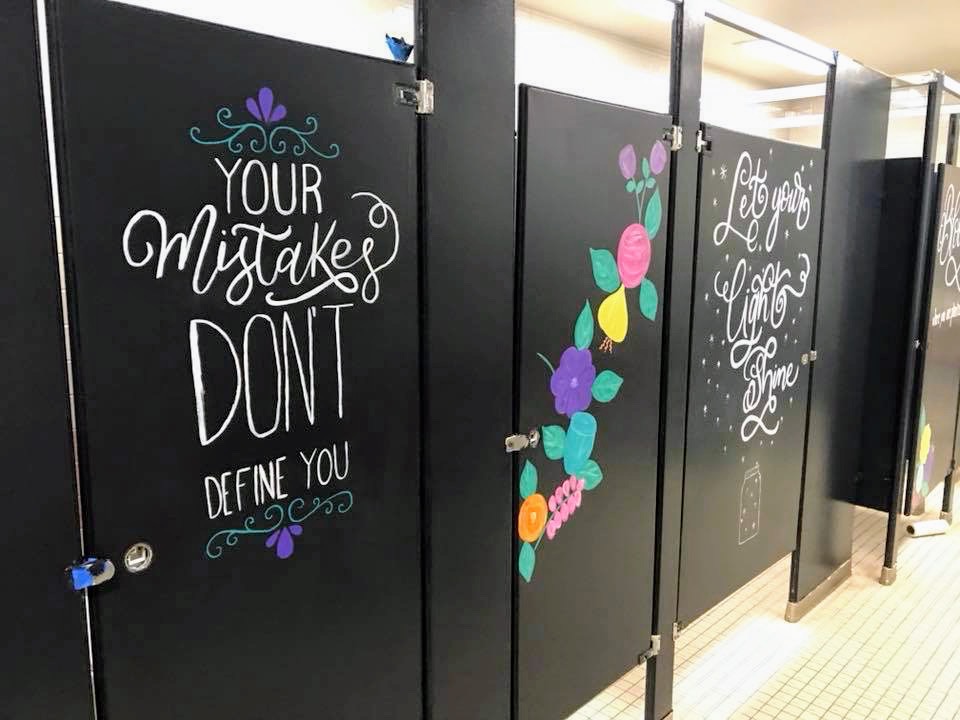 Parents paint motivational art in 5th grade bathrooms to 