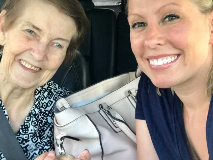 granddaughter takes a car selfie with her grandma with Alzheimer's