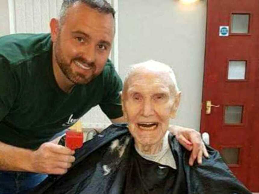 Old woman with dementia getting haircut from barber