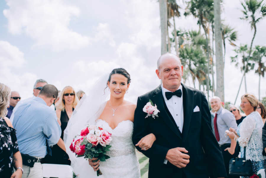 father walking bride down the aisle