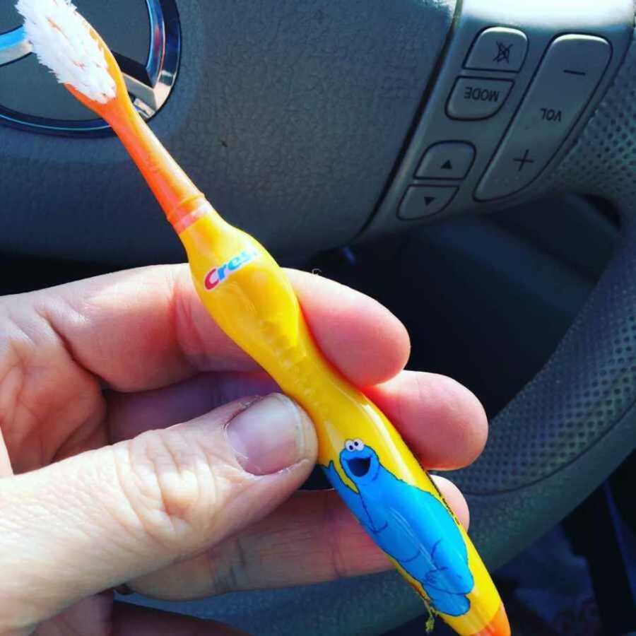 cookie monster toothbrush left behind by foster child