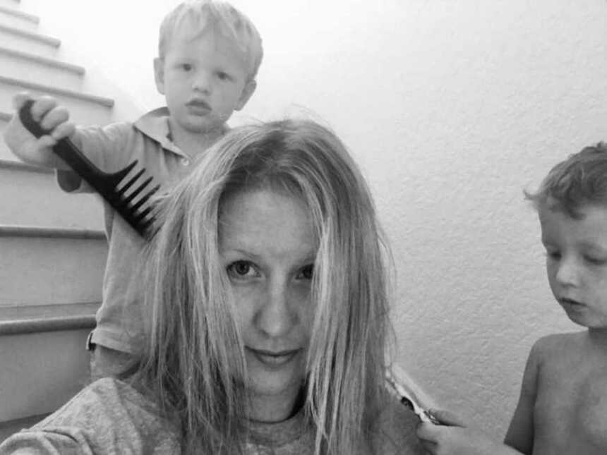 sons brushing mom's hair