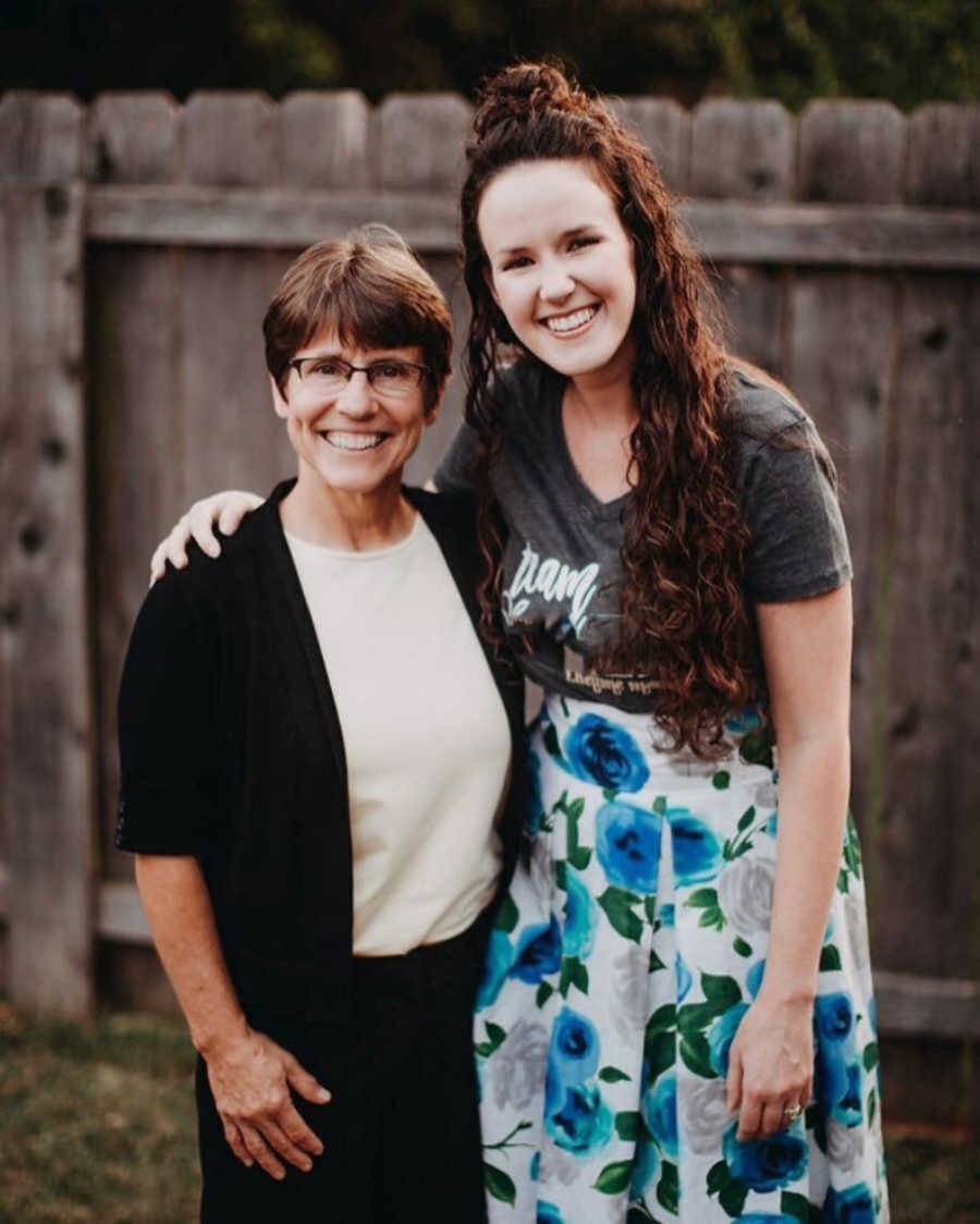 Two foster moms who cared for same children stand together