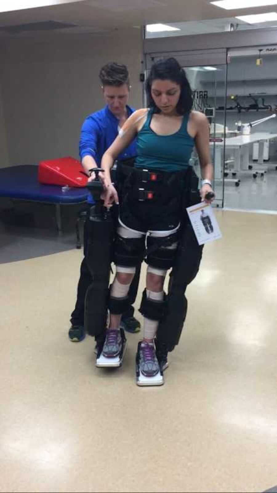 Med student in rehab learning to walk again after surgery