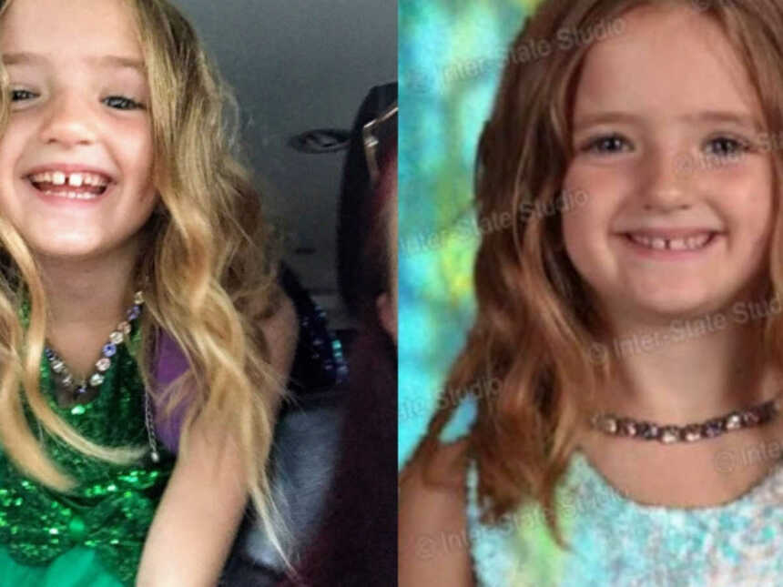little girl in green sparkly dress for her school picture day