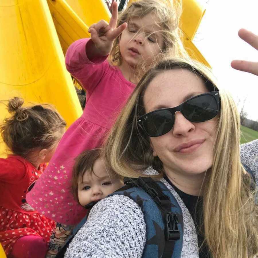 mom takes selfie with kids