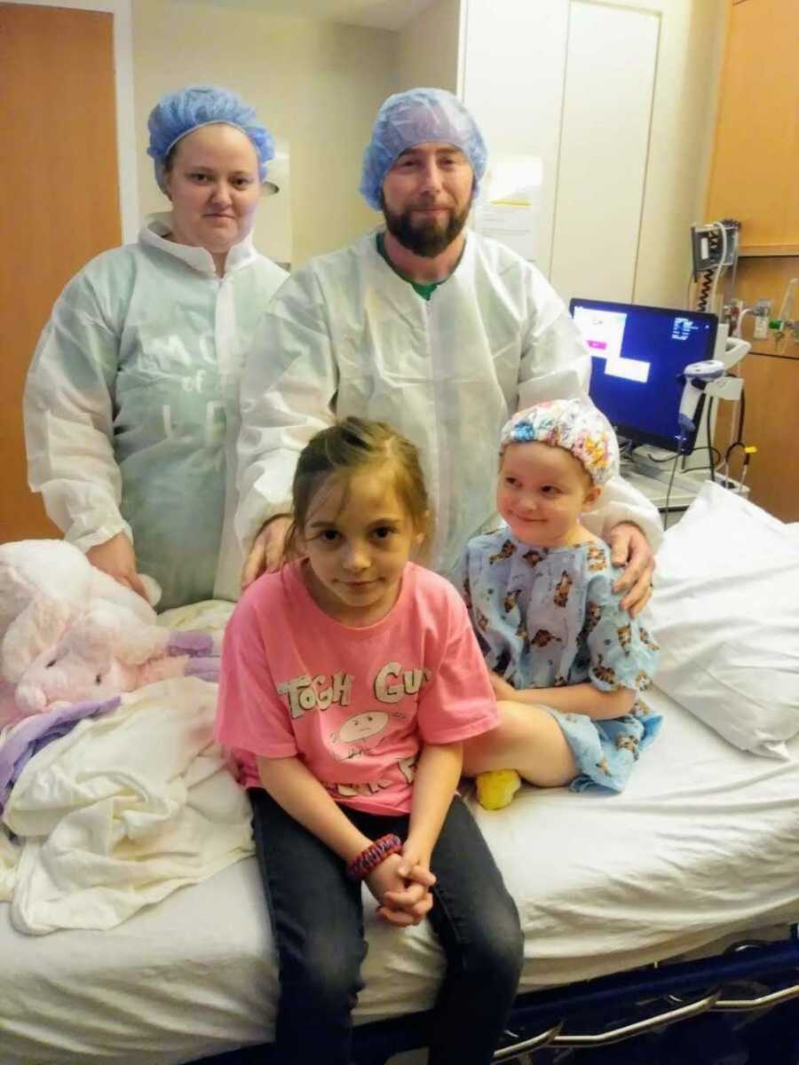 parents and sister in hospital with girl with cancer