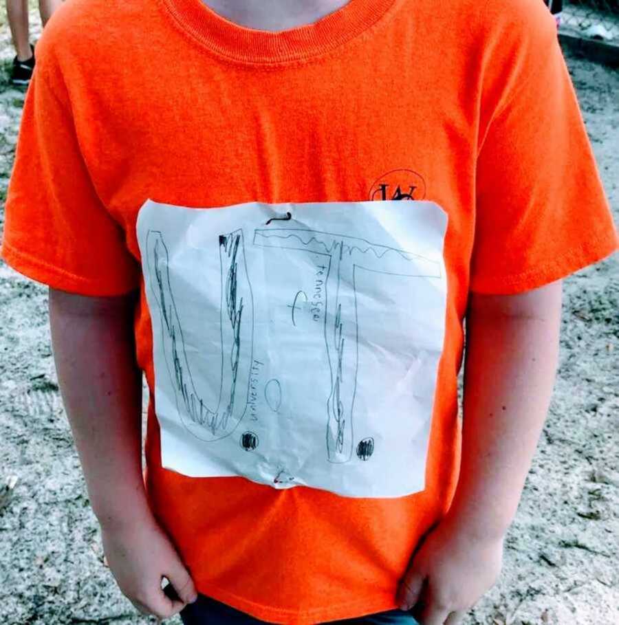 boy wearing homemade "University of Tennessee" shirt