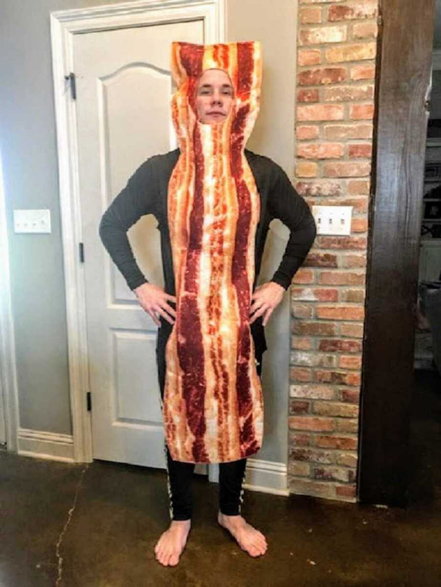 older teen brother wearing a bacon costume