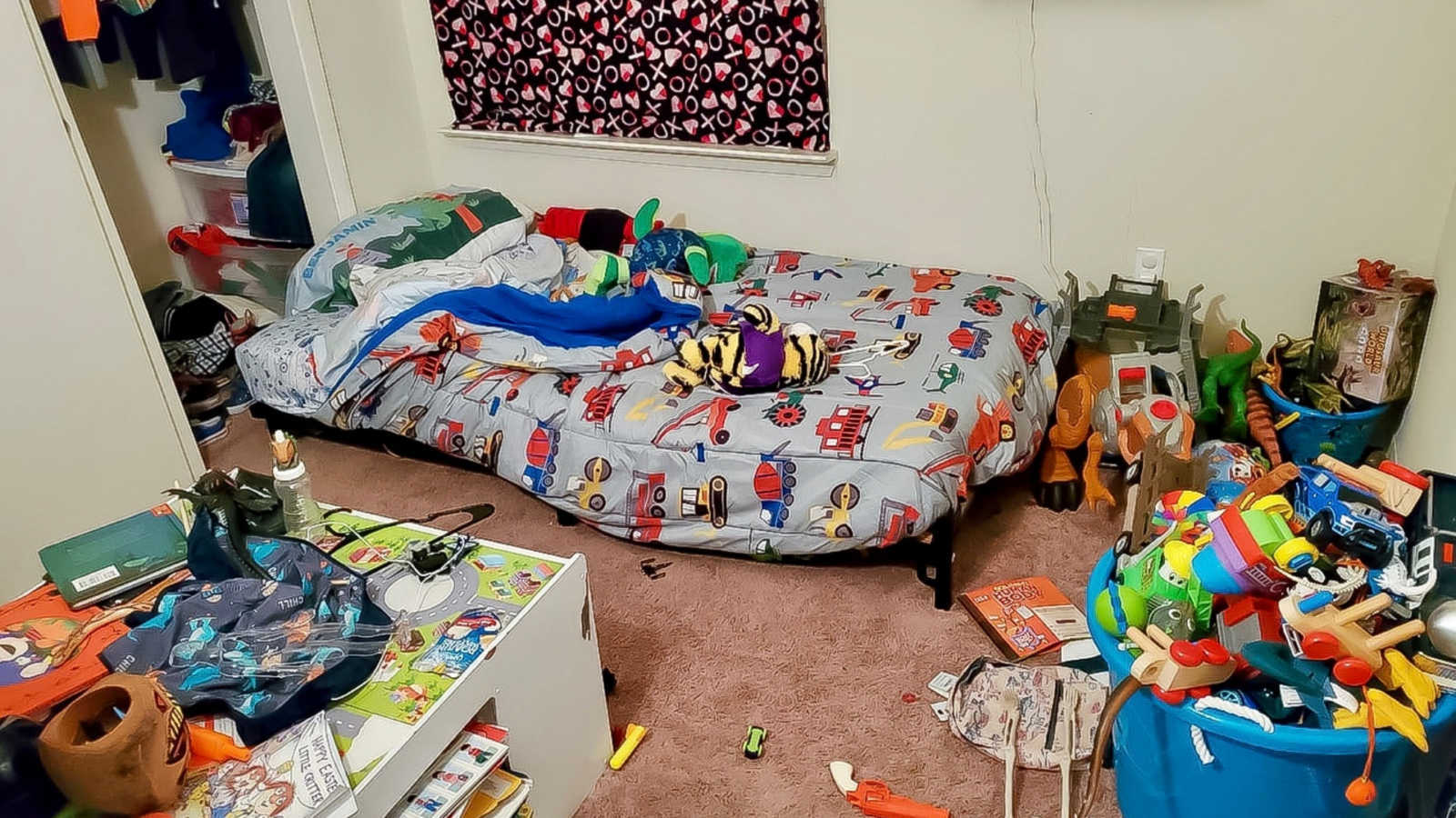 childhood bedroom with toys all around the room