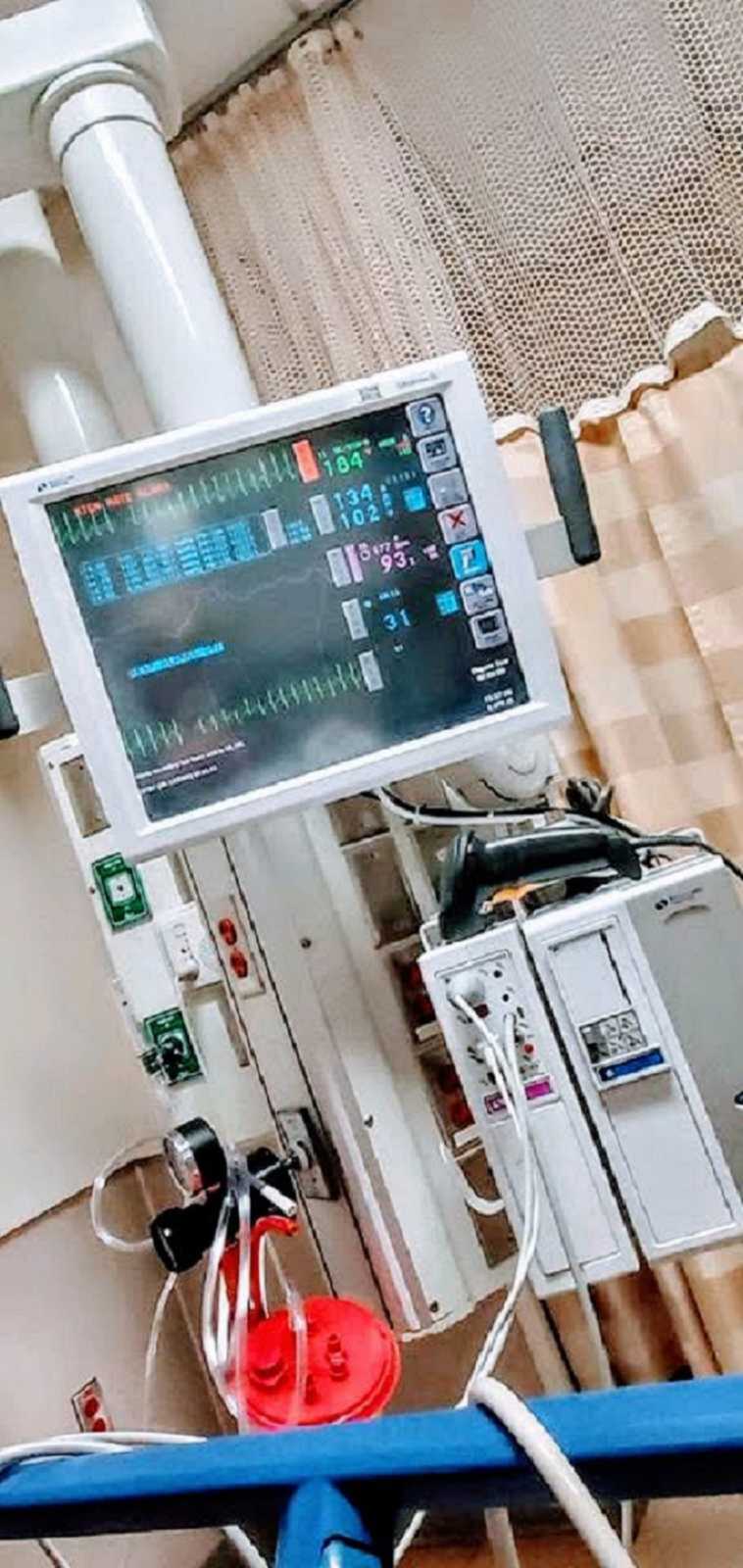 monitor in hospital with vitals on the screen