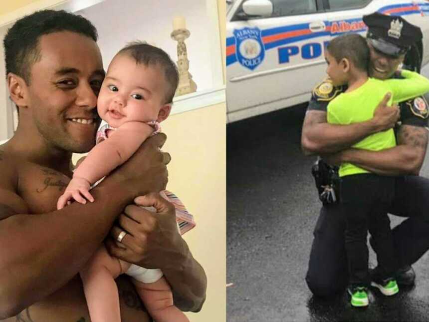 Police officer embracing child