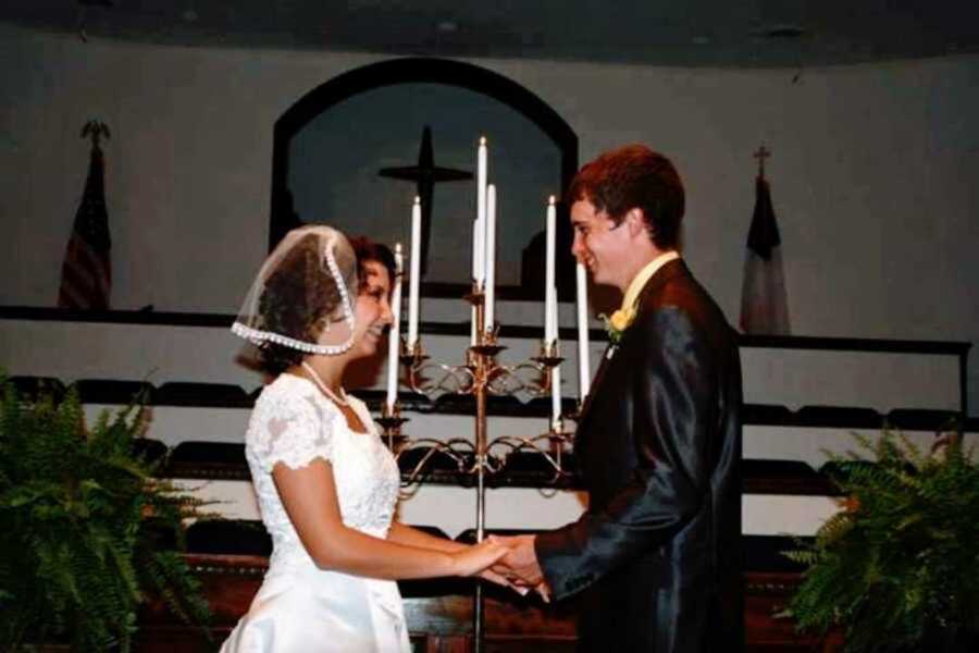 Teen couple getting married at altar