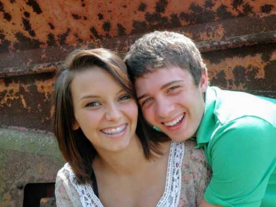 Highschool sweethearts smiling together