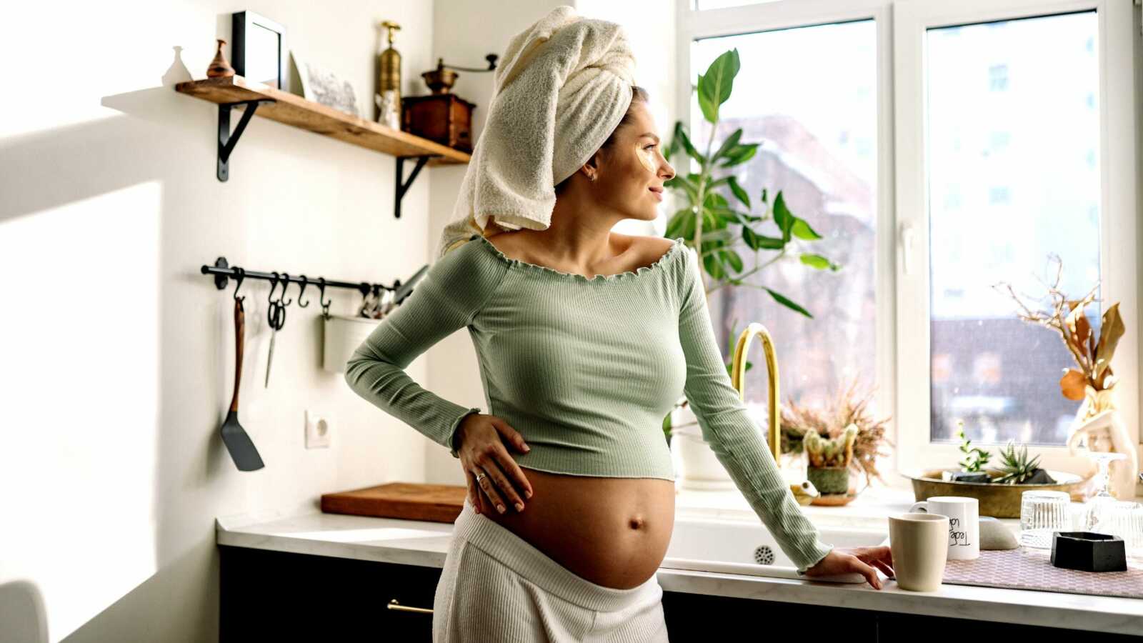 pregnant woman looking outside