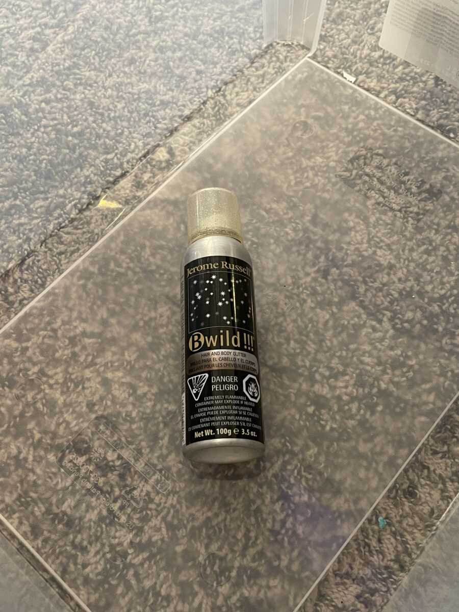 gold and black glitter hairspray