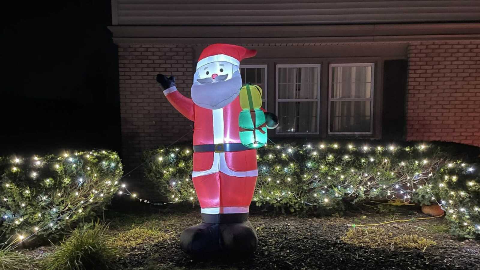 blow up Santa clause Christmas decoration placed in front yard
