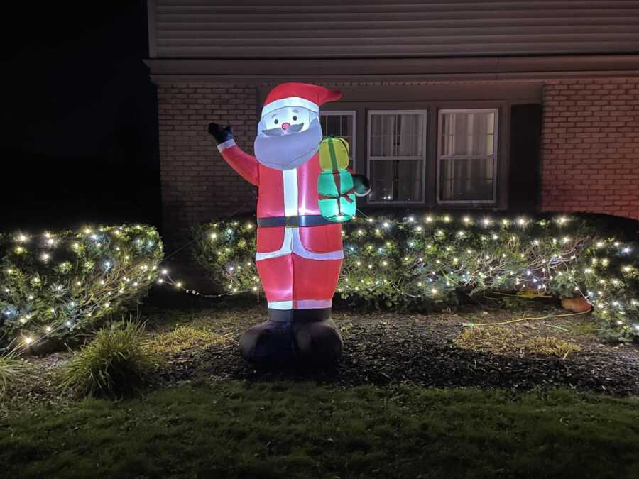 blow up Santa clause Christmas decoration placed in front yard