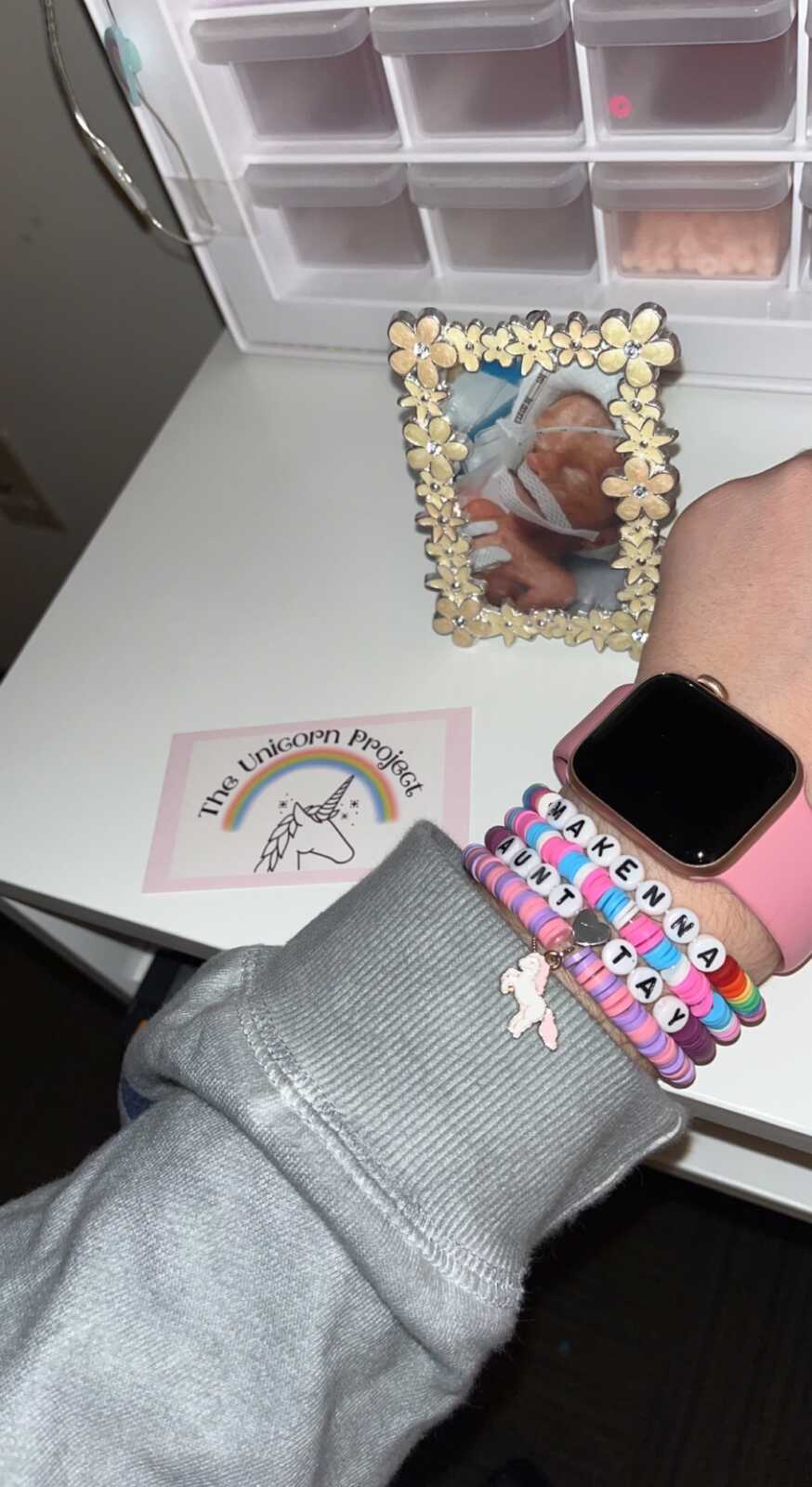 loss mom bestie wearing her "Mak Stack" of bracelets honoring loss baby