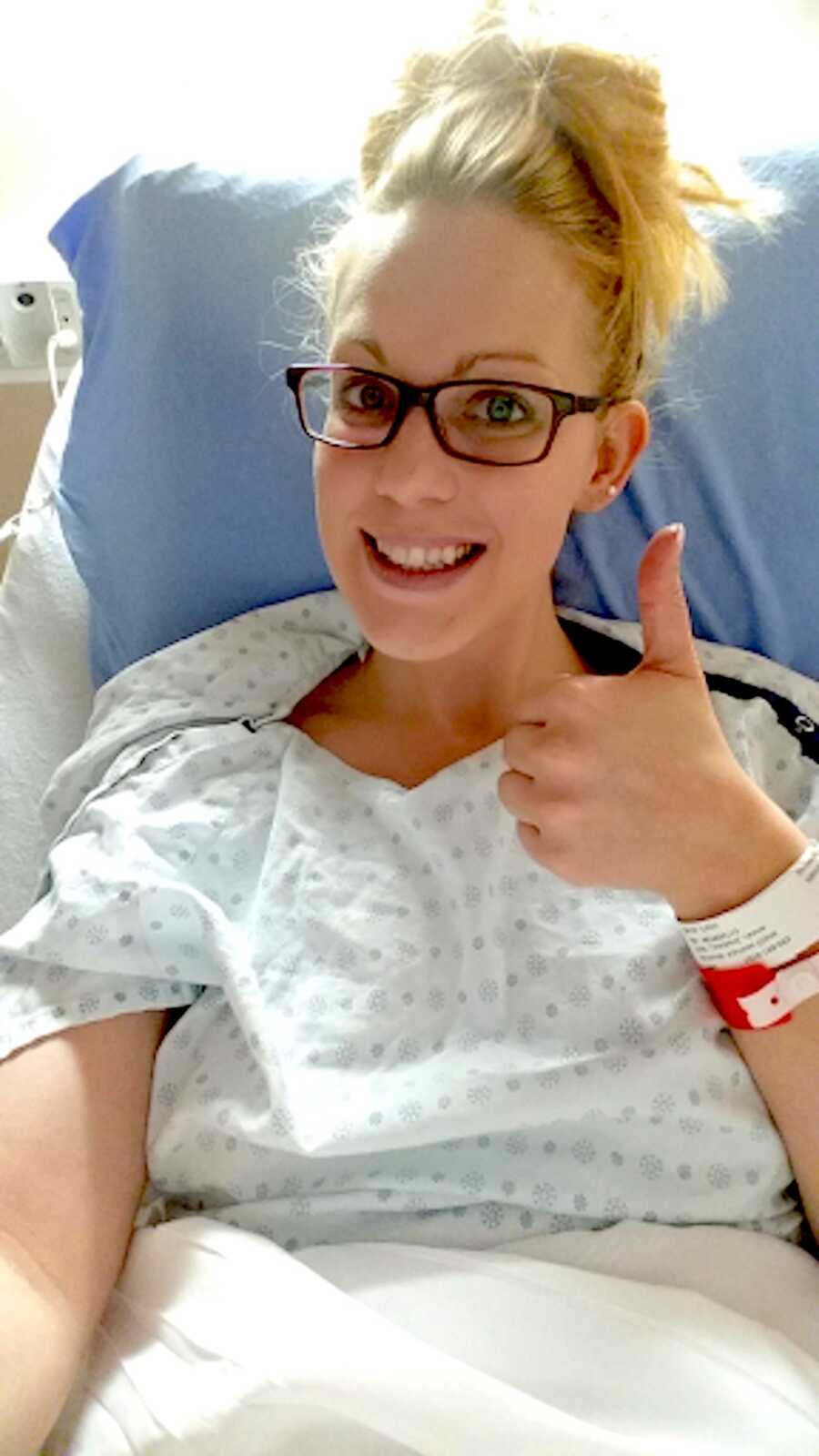 chronic illness warrior in hospital bed before getting hysterectomy
