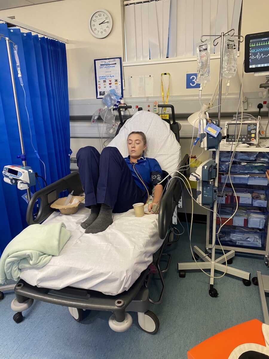 endometriosis warrior laying in hospital bed in the emergency room