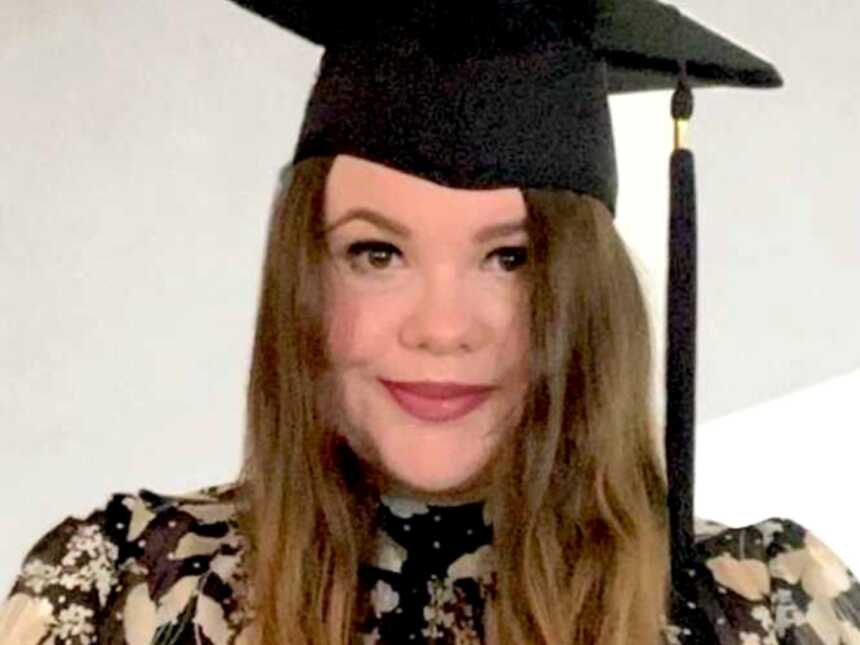 woman with epilepsy in graduation cap