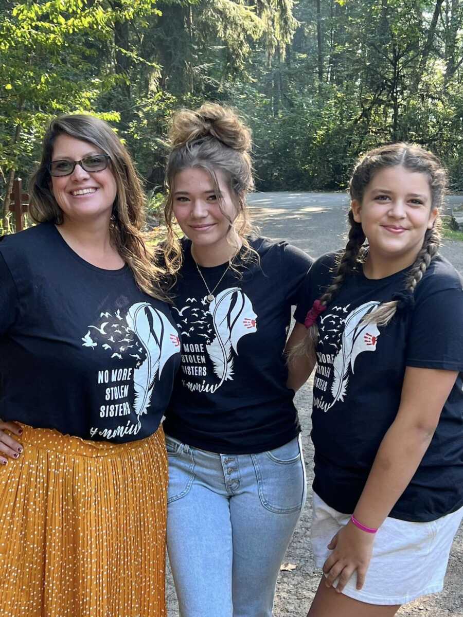 foster mom with two of her daughters outside