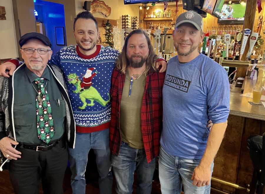 Small business owners of bar grouped up for picture 