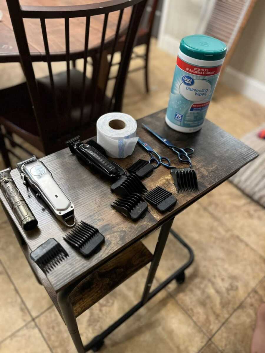 Barber tools lying on wooden desk